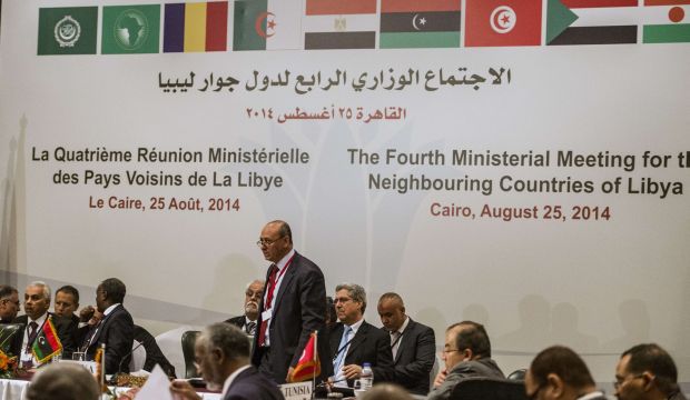 Libyan Foreign Minister Mohamed Abdelaziz stands during a meeting with his counterparts from the states bordering Libya to discuss the situation in the chaos-ridden North African nation on August 25, 2014 in the Egyptian capital Cairo. (AFP Photo/Khaled Desouki)