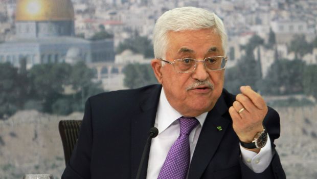In this file photo taken Tuesday, April 29, 2014, Palestinian President Mahmoud Abbas speaks during a meeting with Palestinian businessmen from East Jerusalem to set up a national fund to support the Palestinian residents of East Jerusalem, at his office in the West Bank city of Ramallah. (AP Photos)