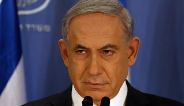 Israeli Prime Minister Benjamin Netanyahu looks on as he speaks during a press conference at the Defense Ministry in Tel Aviv on July 11, 2014. (AFP Photo/Gali Tibbon)