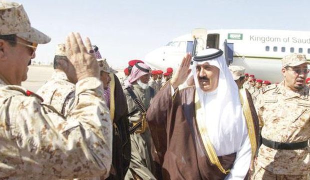 Saudi National Guard Minister Prince Miteb Bin Abdullah Bin Abdulaziz (C) salutes a National Guard soldier as he arrives at the border town of Rafha in the Northern Borders Province in Saudi Arabia, on August 13, 2014. (Asharq Al-Awsat/Abdullah Al Muhsin)
