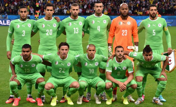 Algeria's national team pose prior to the Round of 16 match between Germany and Algeria at Beira-Rio Stadium in Porto Alegre during the 2014 FIFA World Cup on June 30, 2014.  (AFP Photo/Kirill Kudryavtsev)