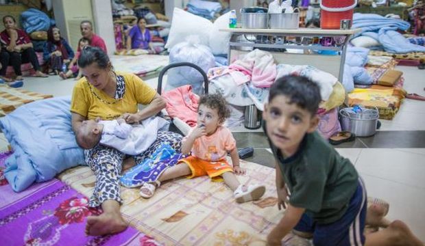 Christian refugees encamp on the area of archdiocese of Erbil, in Erbil, Iraq, August 16 2014. (EPA photos)