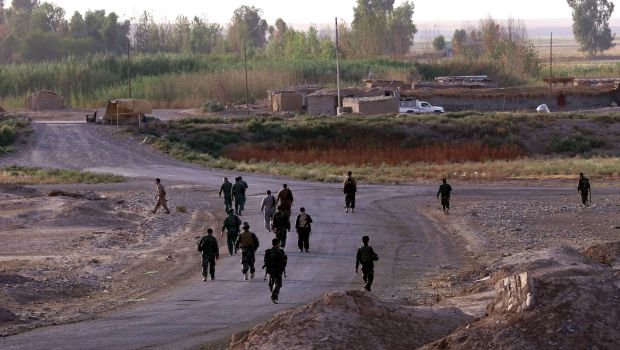 Kurdish Peshmerga fighters take position in the Gwer district, 40 kilometres south of Erbil, the Iraqi Kurdistan's capital, on September 18, 2014.
