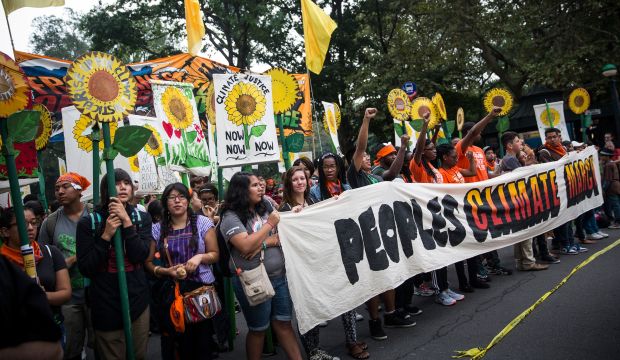 People organize to march in the People's Climate March on September 21, 2014 in New York City. (Andrew Burton/Getty Images/AFP)
