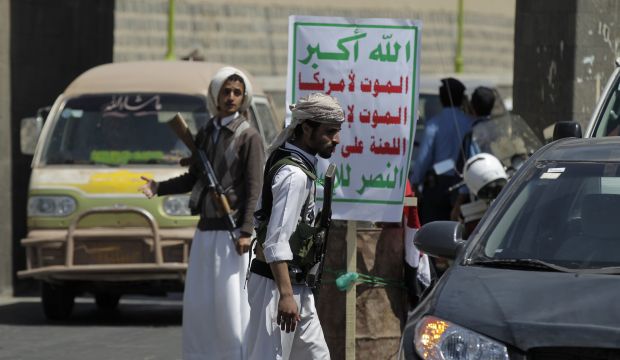 Shi'ite Houthi rebels man a checkpoint in the Yemeni capital Sana'a, on September 24, 2014. (Reuters/Khaled Abdullah)