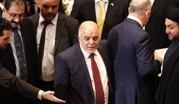 Haider Al-Abadi attends the parliament session to submit his government at the parliament headquarters in Baghdad, Iraq, on September 8, 2014. (Reuters/Thaier Al-Sudani)