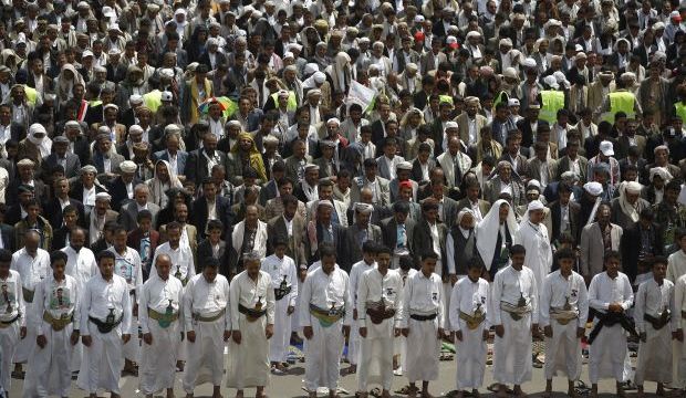 Shi’ite Houthi protesters perform Friday prayers during a funeral procession of fellow protesters who were killed in the recent clashes with Yemeni police in Sana’a, Yemen, on Friday, September 12, 2014. (AP Photo/Hani Mohammed)
