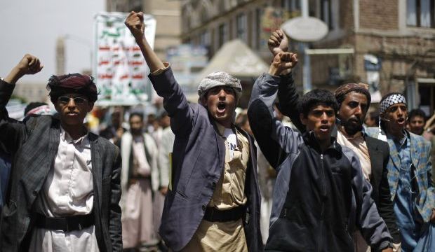 Houthi protesters chant anti-government slogans as they attend a demonstration blocking major roadways in Sana’a, Yemen on Wednesday, September 3, 2014. (AP Photo/Hani Mohammed)