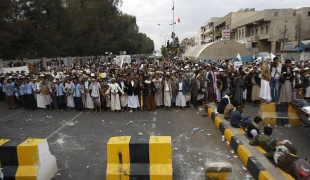 Shi’ite Houthi protesters block a main road leading to the airport during a protest in Sana’a, Yemen, on September 7, 2014. (AP Photo/Hani Mohammed) 