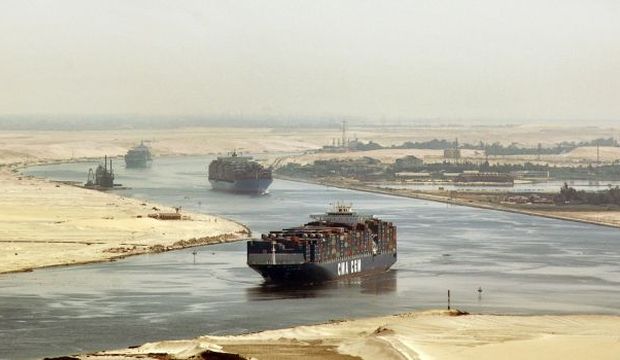 Cargo ships sail through the Suez Canal, seen from a helicopter, near Ismailia, Egypt, in this September 2009 file photo. (AP Photo, File)