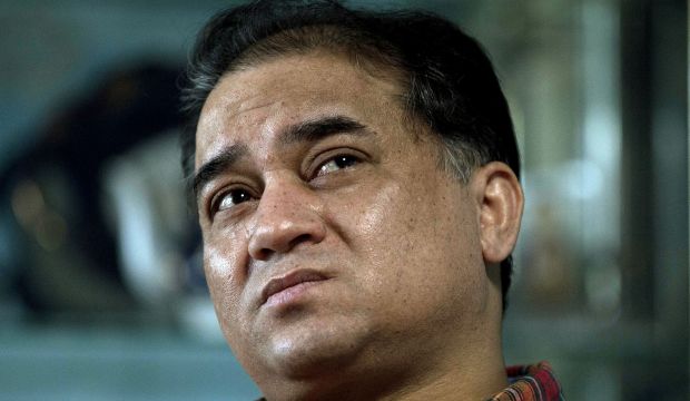 Ilham Tohti, an outspoken scholar of China's Uighur minority, at his home in Beijing, China. (AP Photo/Andy Wong)