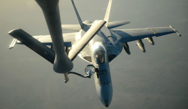 A US Navy F-18E Super Hornet receives fuel from a KC-135 Stratotanker over northern Iraq after conducting airstrikes on ISIS and other targets in Syria. (AP Photo/US Air Force, Staff Sgt. Shawn Nickel)