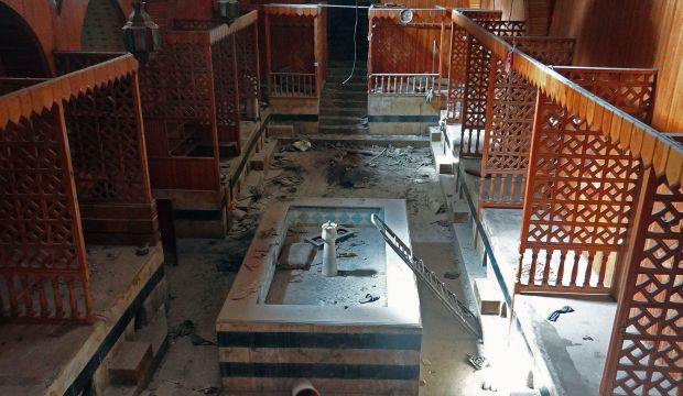 A general view shows damage in the Hammam Al-Nahasin bathhouse, dating back to the 13th century, in the old market of Syria's northern city of Aleppo on February 22, 2014. (AFP Photo/Mahmud Al-Halabi)