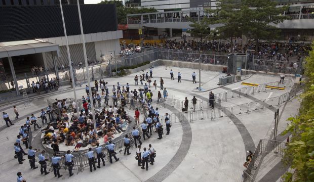 Student protestors are kettled by police at Civic Square in front of Hong Kong's Central government offices on September 27, 2014.  (EPA/Alex Hofford)