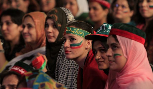 Supporters listen to Imran Khan deliver a speech during what has been dubbed a "freedom march" in Islamabad on September 16, 2014. (Reuters/Faisal Mahmood)