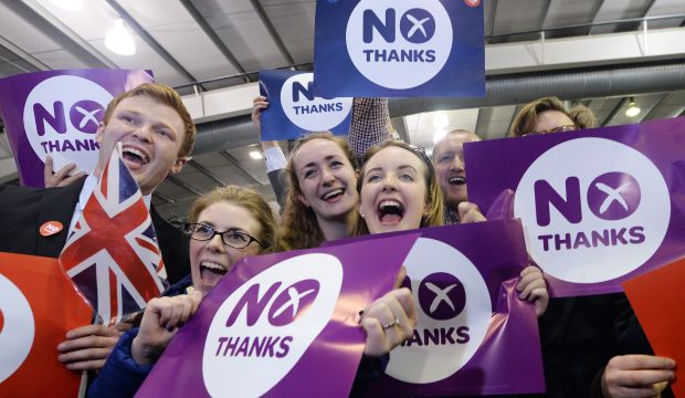 'No' supporters celebrate their win over the 'Yes' campaign at the Royal Highland center during the Scottish referendum in Edinburgh, Scotland, on September 19, 2014. (EPA/Andy Rain)