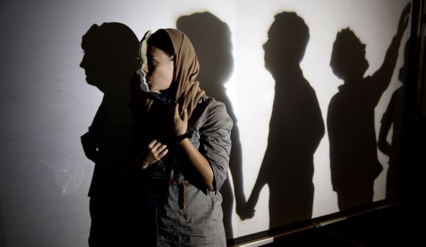 American puppeteer Julia Miller rehearses the day before the Manual Cinema group's performance at the Tehran Mobarak Puppet Festival on September 18, 2014. (AP Photo/Vahid Salemi)