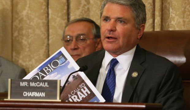 House Homeland Security Committee Chairman Michael McCaul (R-TX) holds up a copy of Dabiq, the English language magazine published ISIS, during a hearing on 'worldwide threats to the homeland' in the Cannon House Office Building on Capitol Hill in Washington, DC on  September 17, 2014. (Chip Somodevilla/Getty Images/AFP) 