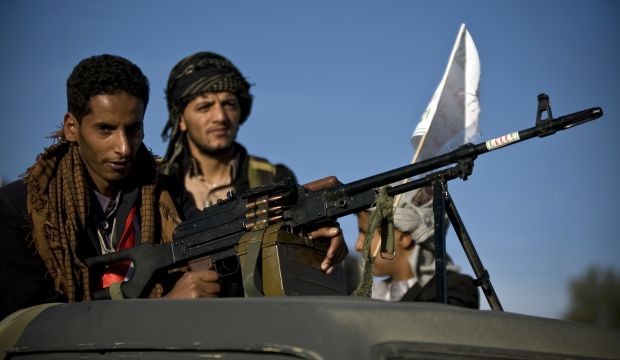 A Houthi rebel on patrol following dawn prayers attended by supporters of the rebels on the first day of the Muslim holiday of Eid Al-Adha, in Sana'a, Yemen, on October 4, 2014. (AP Photo/Hani Mohammed)