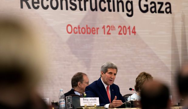 U.S Secretary of State John Kerry speaks in Cairo, Egypt, during the Gaza Donor Conference, on October 12, 2014 (AP Photo/Carolyn Kaster, Pool)