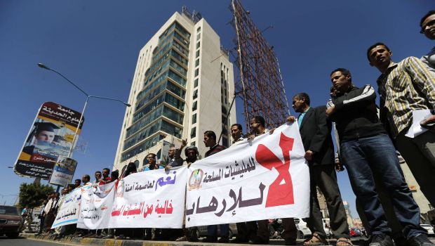 Protesters demonstrate against militancy and violence in Sana'a October 21, 2014. (Reuters Photos)