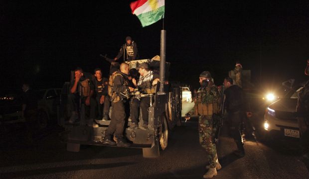 Kurdish Peshmerga troops participate in an intensive security deployment against Islamic State of Iraq and Syria (ISIS) militants in Zammar, Iraq, on October 25, 2014. (Reuters/Ari Jalal)