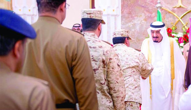 Saudi Arabia's Crown Prince Salman receiving military officers and the heads of Hajj delegations at the Royal Palace on October 4, 2014 (SPA)