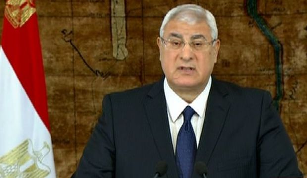 Egypt's former interim President Adly Mansour speaks at the presidential palace in Cairo, Egypt, on Sunday, January 26, 2014. (AP Photo/Egyptian State Television)