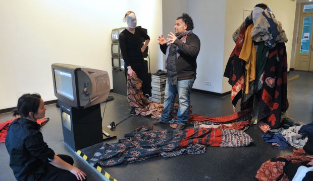 Choreographer Hooman Sharifi (C) and his dancers at the Paris exhibition titled "Action 1" on May 10, 2014. (Miguel Medina/AFP/Getty Images)
