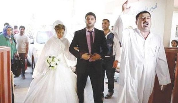 Reem and Mohamed on their wedding day. (Asharq Al-Awsat)