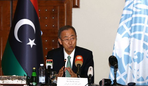 UN Secretary General Ban Ki-moon speaks to the press upon his arrival in Tripoli for a surprise visit on October 11, 2014 aimed at at bolstering talks between political parties. (AFP/Mahmud Turkia)