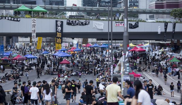 Pro-democracy demonstrators gather outside Hong Kong's government offices in Hong Kong, China, on October 2, 2014. (EPA/Jerome Favre)