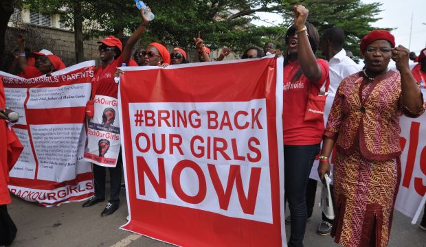 Nigerians call on their government to rescue the girls taken from a secondary school in Chibok, in Abuja, Nigeria on October 14, 2014. (AP Photo/Olamikan Gbemiga File)