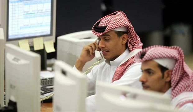 File photo of traders at the Saudi Stock Exchange (Tadawul) in Riyadh. (Reuters)
