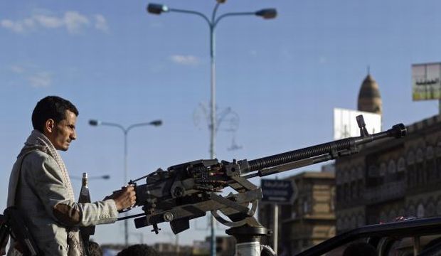 Member of the Shi'ite Muslim Houthi movement mans a machine gun during a patrol in Sana'a. (Reuters)