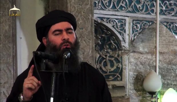 An image from a propaganda video by Al-Furqan Media allegedly shows the leader of the Islamic State of Iraq and Syria (ISIS) Abu Bakr Al-Baghdadi, on July 5, 2014. (AFP Photo/HO/Al-Furqan Media)