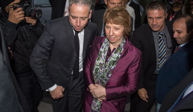 Former Vice President of the European Commission Catherine Ashton (C) arrives for a working lunch with the Iranian Foreign Minister at the Iranian Embassy during the P5+1 talks with Iran in Vienna on November 18, 2014. (AFP PHOTO / JOE KLAMAR)