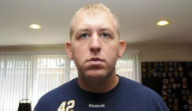 Officer Darren Wilson is pictured in this undated handout evidence photo from the August 9 Ferguson Police shooting of Michael Brown in Ferguson, Missouri, released by the St. Louis County Prosecutor's Office on November 24, 2014. (Reuters/St. Louis County Prosecutor's Office/Handout via Reuters)