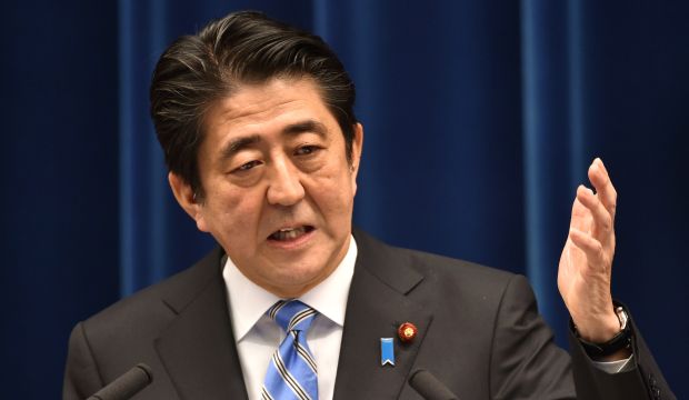 Japan's Prime Minister Shinzo Abe speaks during a press conference at his official residence in Tokyo on November 18, 2014.  (AFP Photo/Kazuhiro Nogi)