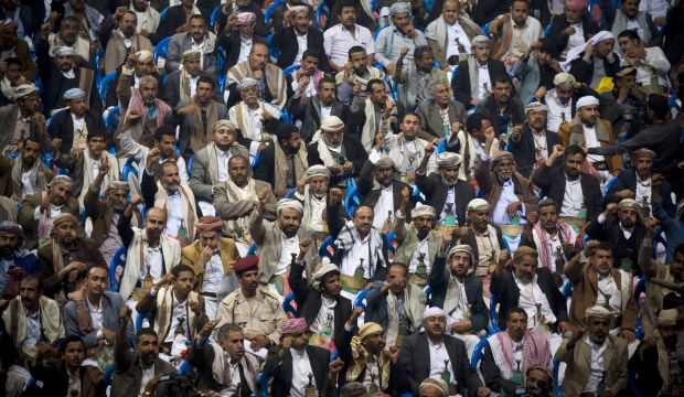 Yemenis chant slogans as they attend a tribal meeting held by Houthi Shiite rebels in Sanaa, Yemen, Friday, Oct. 31, 2014.  (AP Photo/Hani Mohammed)