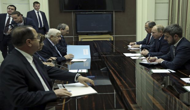 Syria's Foreign Minister Walid Al-Mouallem (3rd L) speaks to Russia's President Vladimir Putin (2nd R) and Foreign Minister Sergey Lavrov (3rd R) during a meeting in Sochi on November 26, 2014. (Reuters/Mihail Metzel)