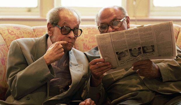 Egyptian author Naguib Mahfouz (L) wrote the highly-acclaimed Cairo Trilogy. (Ulf Andersen/Getty Images)