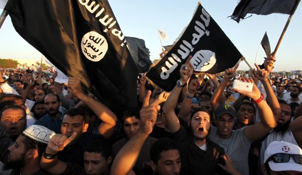 Libyan followers of Ansar Al-Shari'a Brigades and other Islamic militias hold a demonstration against a film and a cartoon denigrating the Prophet Muhammad in Benghazi, Libya, on September 21, 2012. (AP Photo/Mohammad Hannon, File)