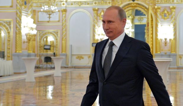 Russian President Vladimir Putin arrives to give his annual state of the nation address in the Kremlin in Moscow, Russia, on December 4, 2014. (AP Photo/RIA-Novosti,  Alexei Druzhinin, Presidential Press Service)