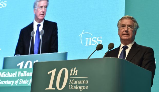 Michael Fallon, British Secretary of State for Defence, addresses a session of the 10th Manama Dialogue in Manama, on December 6, 2014. (EPA/MAZEN MAHDI)