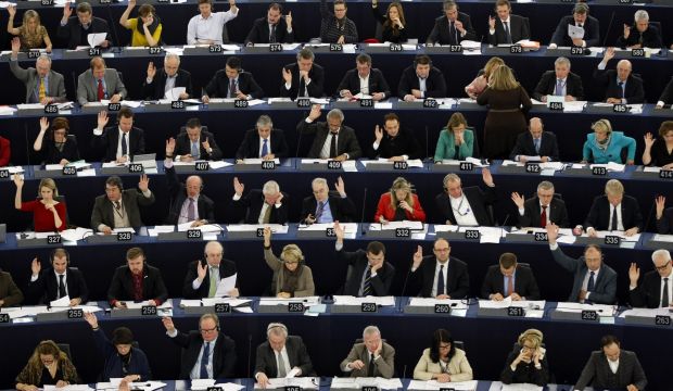 Members of the European Parliament take part in a vote in favor of a resolution on recognition of the statehood of Palestine in Strasbourg, France on December 17, 2014. (AP Photo/Christian Lutz)