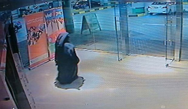 This image made from video released by the Abu Dhabi police department on Tuesday, December 2, 2014 shows a veiled suspect in the stabbing of an American teacher in a shopping mall restroom as seen on security camera footage in Abu Dhabi, United Arab Emirates.  (AP Photo/Abu Dhabi police)
