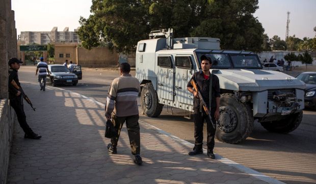 Egyptian security forces are seen at the site of bombing carried out by Ajnar Misr at the Helwan University, southern Cairo, Egypt, 20 November 2014.  (EPA/Eman Helal)