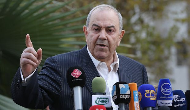 Iraqi Vice-President Iyad Allawi speaks to reporters in Baghdad, Iraq, on December 29, 2013. (AP Photo/Hadi Mizban)