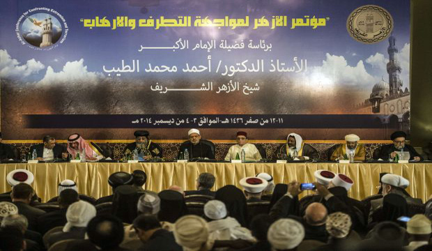 The Grand Imam of Al-Azhar Sheikh Ahmed Al-Tayeb (5th R) and Coptic Pope Tawadros (3rd L) attend the opening session of a two-day international conference in Cairo on fighting extremism, on December 3, 2014.  (AFP/Khaled Desouki)